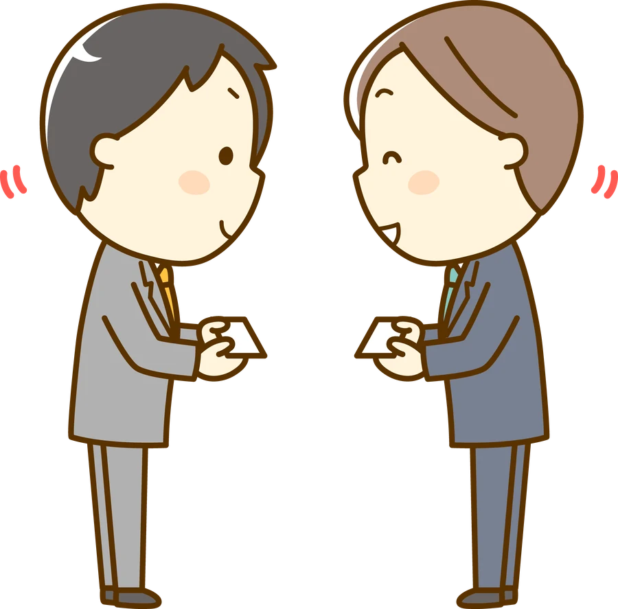 名刺を交換しているビジネスパーソン